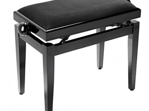 Upholstered bench included with a used piano