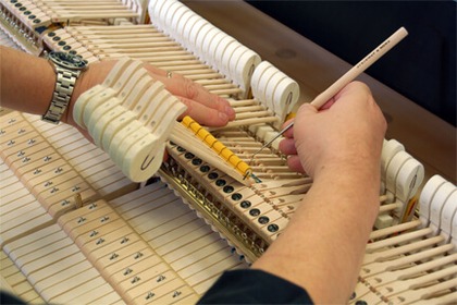 Five-year warranty included with a used piano